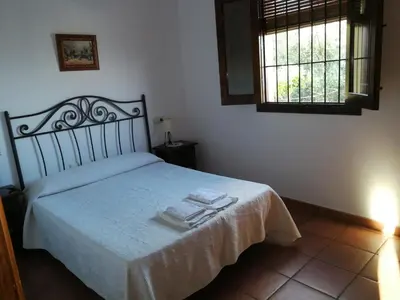Cama o camas de una habitación en Casa Rural La Loma