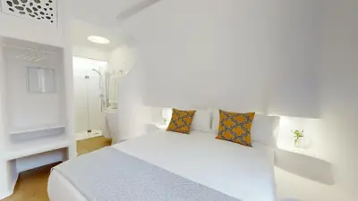 Cama o camas de una habitación en Hotel Suite Generis
