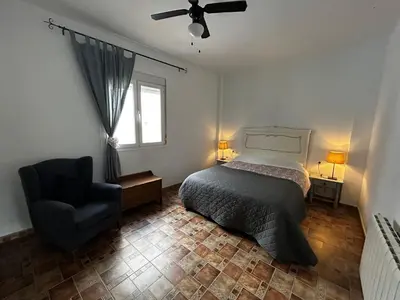 Cama o camas de una habitación en Spacious Apartment with AC and central heating