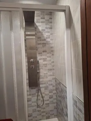 Un baño de Apartamento Completo Regina