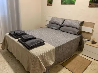 Cama o camas de una habitación en Apartamento Completo Regina