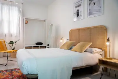 Cama o camas de una habitación en MonKeys Apartments Alameda