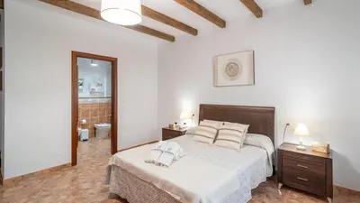 Cama o camas de una habitación en Casa La Sombra de la Parra Antequera - La Higuera by Ruralidays