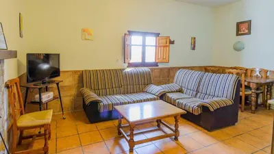 Una televisión o centro de entretenimiento en La Casita Montefrio by Ruralidays
