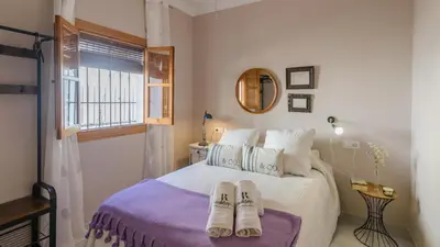Cama o camas de una habitación en Torreón de Morayma Baena by Ruralidays