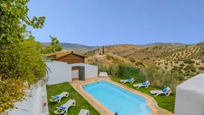 Piscina en o cerca de Casa Dehesa de las Casas Algarinejo by Ruralidays