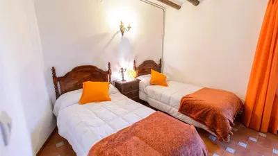 Cama o camas de una habitación en Casa Carmela Priego de Cordoba by Ruralidays