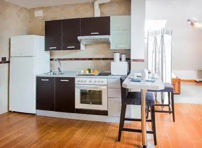 Una cocina o zona de cocina en La Casa del Maestro de Música