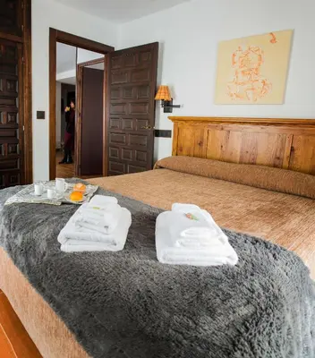 Cama o camas de una habitación en La Casa del Maestro de Música