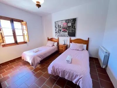 Cama o camas de una habitación en Casa Rural Huerta Abuela María