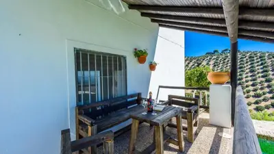 Un balcón o terraza de Casa La Choza de Mamuyo Montefrio by Ruralidays