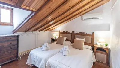 Cama o camas de una habitación en Casa La Palmera Villanueva de la Concepcion by Ruralidays