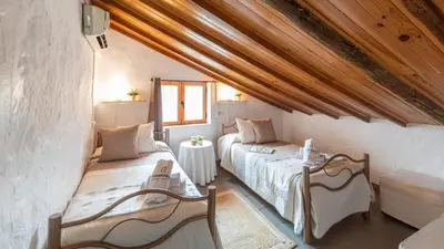 Cama o camas de una habitación en Casa La Palmera Villanueva de la Concepcion by Ruralidays