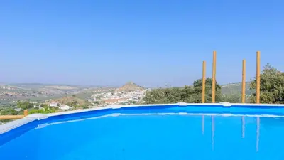 Piscina en o cerca de Cortijo La Umbria Villanueva de Algaidas by Ruralidays