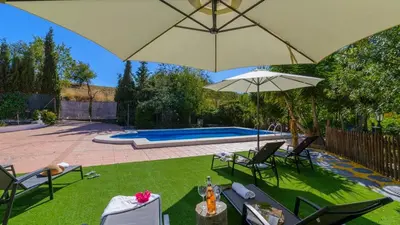 Piscina en o cerca de Villa El Molinillo Casabermeja by Ruralidays