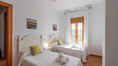 Cama o camas de una habitación en Casa Mari de Almogia by Ruralidays