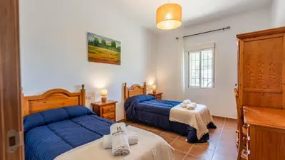 Cama o camas de una habitación en Casa El Olimpo Alora by Ruralidays