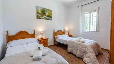 Cama o camas de una habitación en Casa El Olimpo Alora by Ruralidays