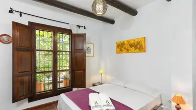 Cama o camas de una habitación en Casa La Loma del Sabinal Alora by Ruralidays