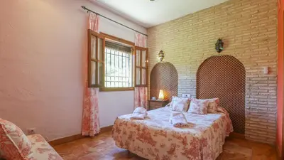 Cama o camas de una habitación en Casa Huerta El Fontanarillo Montemayor by Ruralidays