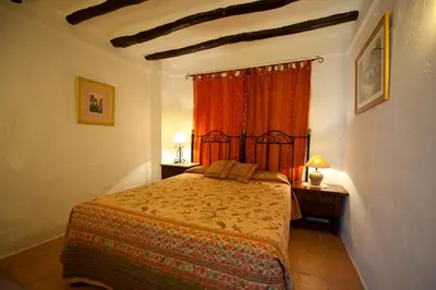 Cama o camas de una habitación en Cortijo La Haza