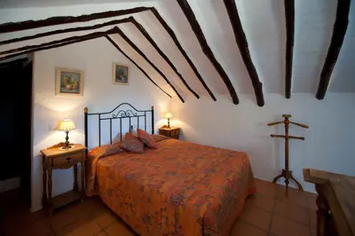 Cama o camas de una habitación en Cortijo La Haza