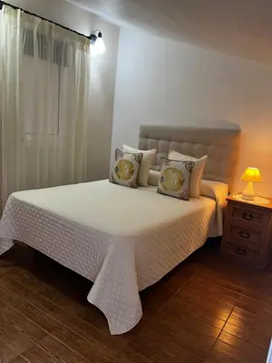Cama o camas de una habitación en Casa Rural Abril