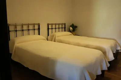 Cama o camas de una habitación en LOS NOGALES