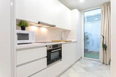 Una cocina o zona de cocina en Genteel Home Feria