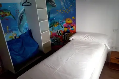 Cama o camas de una habitación en Casa de los Olmos