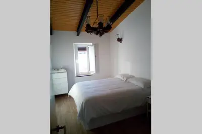 Cama o camas de una habitación en Casa de los Olmos