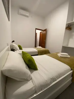 Cama o camas de una habitación en Alameda Urban Apartment