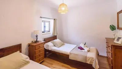 Cama o camas de una habitación en Casa Rural La teja (Caminito del Rey)