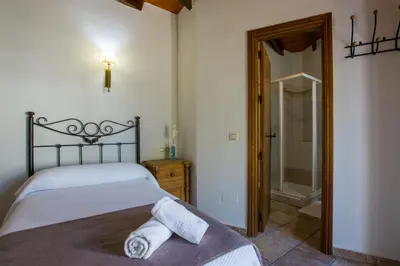 Cama o camas de una habitación en Hostal Valle Del Sol Alora