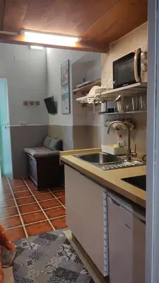 Una cocina o zona de cocina en Alcázares Sevilla centro