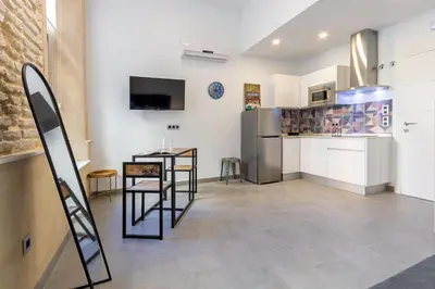 Una cocina o zona de cocina en Nine O Clock San Agustin