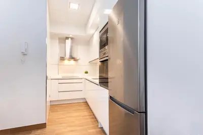 Una cocina o zona de cocina en Genteel Home Recaredo