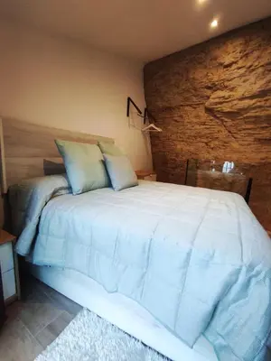 Cama o camas de una habitación en Casa cueva La Tosca