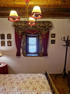 Cama o camas de una habitación en Colonos Alojamientos Rurales