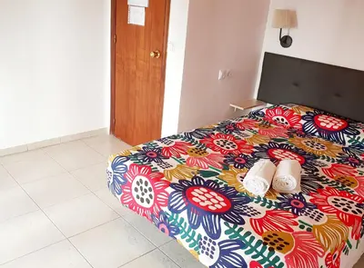 Cama o camas de una habitación en Arc House Ribera Only Adults