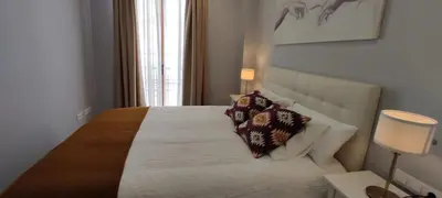 Cama o camas de una habitación en GRUPO LIMCOTEL PERLAS dE LA AXERQUIA