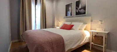 Cama o camas de una habitación en GRUPO LIMCOTEL PERLAS dE LA AXERQUIA