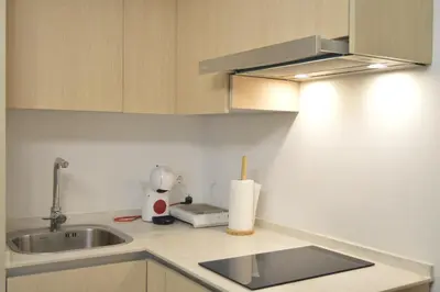 Una cocina o zona de cocina en FLEMING Loft PARKING Tourist Córdoba