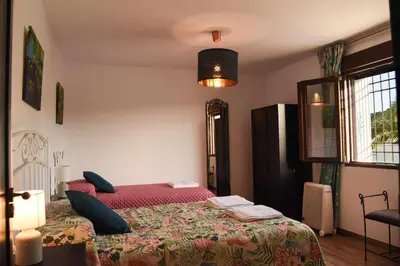 Cama o camas de una habitación en Casa Rural Era · 12 personas y mascotas · Córdoba