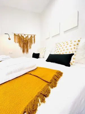 Cama o camas de una habitación en Alojamiento Hermanos Garnelo