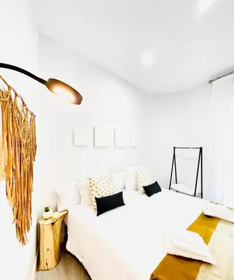 Cama o camas de una habitación en Alojamiento Hermanos Garnelo