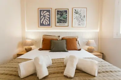 Cama o camas de una habitación en Bright apartment in the heart of La Alfalfa