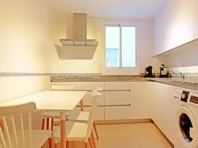 Una cocina o zona de cocina en Apartamentos Santiago