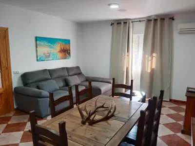 Zona de estar de Dos casas rurales en Despeñaperros, La Reconquista y Nuevas Poblaciones