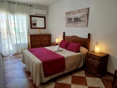 Cama o camas de una habitación en Dos casas rurales en Despeñaperros, La Reconquista y Nuevas Poblaciones